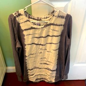 A grey and white tye-dye looking long-sleeve shirt